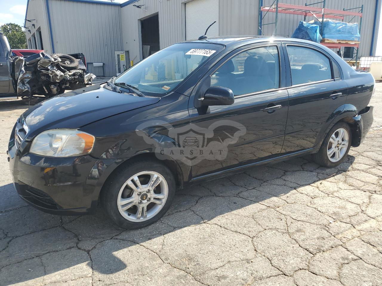 Chevrolet Aveo (Sonic) LS 1.6L  4 2011